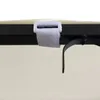 A close-up view of a strap and buckle attached to the frame of a cream-colored awning. Produktbild-Vorschau