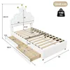 A diagram showing the dimensions of a white bed with a crown-shaped headboard and drawers. Náhled obrázku produktu