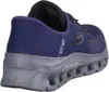 A close-up side view of a blue and gray Skechers shoe. Anteprima dell’immagine prodotto