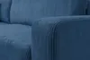 Close-up of a blue corduroy sofa armrest and cushion. Produktbild-Vorschau
