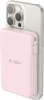 A pink power bank is attached to the back of a silver smartphone. Podgląd zdjęcia produktu