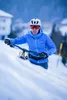 A person is pushing a bicycle through deep snow. Produktbild-Vorschau