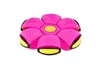 A pink, flower-shaped toy that can transform from a flat disc to a ball. Anteprima dell’immagine prodotto
