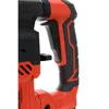 A close-up view of the handle and trigger mechanism of a red and black power tool. Náhľad obrázku produktu