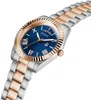 A close-up, angled view of a two-tone watch with a blue dial and rose gold accents. Produktbild-Vorschau