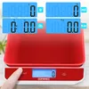 A red kitchen scale with multiple digital displays showing weight and volume measurements. Produktbild-Vorschau