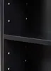 Close-up view of the interior of a black shelving unit. Náhled obrázku produktu