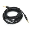 A coiled black audio cable with gold-plated 3.5mm jack connectors on both ends, isolated on a white background. Anteprima dell’immagine prodotto