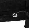Close-up of a black fabric product with a wire passing through a circular opening. Náhled obrázku produktu