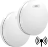 Two white smoke detectors are shown against a white background. Voir les images du produit