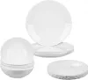 A stack of white plates and bowls on a white background. Podgląd zdjęcia produktu