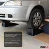 A car is parked on ramps in a garage. Náhled obrázku produktu