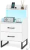 A white nightstand with two drawers and an open shelf, featuring LED lighting and a wireless charging station on top. Anteprima dell’immagine prodotto