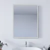 A bathroom mirror mounted on a white wall above a sink with a faucet. Náhľad obrázku produktu