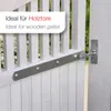 A close-up view of a metal gate hinge attached to a white wooden gate. Produktbild-Vorschau