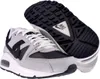 A pair of Nike Air Max Command sneakers shown from a diagonal angle, with one shoe slightly elevated to reveal the sole. Produktbild-Vorschau