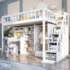 A white loft bed with integrated desk, wardrobe, and shelves, set up in a child's room with decorative clouds on the wall. Podgląd zdjęcia produktu
