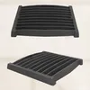 Two views of a black cast iron grate, likely for a fireplace or stove, presented against a neutral background. Produktbild-Vorschau