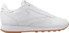 A side view of a white Reebok Classic Leather sneaker with a brown sole. Produktbild-Vorschau