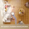 A robot vacuum cleaner is shown navigating a living room floor, with a sofa and coffee table visible. A blue path indicates the robot's cleaning route. Produktbild-Vorschau