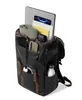 A black backpack filled with various items, including a laptop, books, a phone, and a water bottle. Produktbild-Vorschau