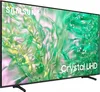 A Samsung Crystal UHD TV is shown from a diagonal angle, displaying a vibrant green abstract image on its screen. Produktbild-Vorschau