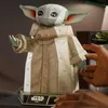 A 3D puzzle of Grogu from Star Wars is being assembled by a person. Náhľad obrázku produktu