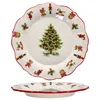 A Christmas-themed plate with a Christmas tree in the center and various Christmas ornaments around the rim. Náhled obrázku produktu
