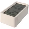 A digital alarm clock with a beige casing and a black display. Náhled obrázku produktu