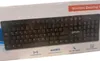 A black wireless keyboard and mouse set is displayed on its packaging. Náhľad obrázku produktu
