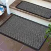 Two doormats are shown, one on the floor and one on a step. Podgląd zdjęcia produktu