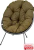 A round, cushioned chair with a woven frame and three metal legs, set against a white background. A small red and white label is visible in the bottom right corner. Produktbild-Vorschau