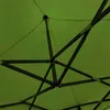 Close-up view of the internal metal frame and green fabric of a pop-up tent or canopy. Voir les images du produit