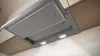 A close-up, underside view of a modern kitchen range hood. Produktbild-Vorschau