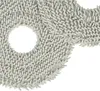 A close-up view of a circular, fuzzy, light gray cleaning pad with a hole in the center. Produktbild-Vorschau