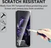A hand is shown holding a key near a smartphone screen protector, demonstrating its scratch-resistant properties. Produktbild-Vorschau