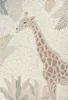 A rug with a giraffe pattern and tropical leaves. Náhled obrázku produktu
