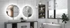 A modern bathroom with two sinks, a bathtub, and a large window. Voir les images du produit
