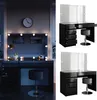 A split image showing a vanity table with LED lights and a stool in a room setting on the left, and a product shot of the same vanity table and stool with a transparent mirror on the right, with two different angles. Náhled obrázku produktu
