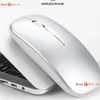 A silver wireless mouse is placed on top of a laptop keyboard. Produktbild-Vorschau