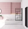 A modern bathroom with a bathtub, a shower screen, and pink tiled walls. Produktbild-Vorschau