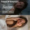 A split image showing a woman sleeping peacefully in bed, with text overlays describing timers and schedules for a smart home device. Produktbild-Vorschau