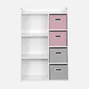 A white bookshelf with pink and gray storage boxes. Produktbild-Vorschau