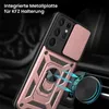 A rose gold phone case with a ring holder is shown attached to a car vent mount. Produktbild-Vorschau
