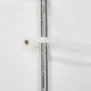 A close-up view of a white plastic bracket screwed to a white wall, holding a chrome shelf pole with a white zip tie. Voir les images du produit
