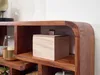 A close-up view of a wooden shelf with a small wooden box on it. Voir les images du produit