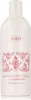 A white bottle of body wash with pink decorative elements and text. Anteprima dell’immagine prodotto