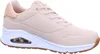 A side view of a single beige sneaker with a white sole and brown outsole, set against a white background. Produktbild-Vorschau