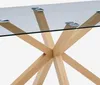 A close-up view of a table's base, showing the wooden legs and glass tabletop. Anteprima dell’immagine prodotto