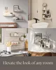 A collage of four images showing white wooden shelves in different room settings, with the text 'Elevate the look of any room' at the bottom. Produktbild-Vorschau
